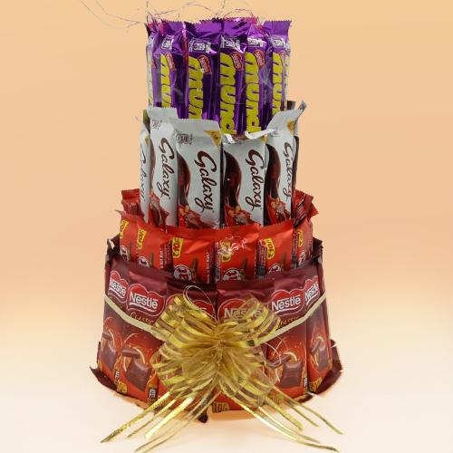Expressive 4 Layer Tower Arrangement of Assorted Chocolates