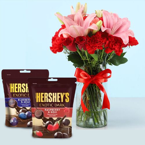 Lovely Mixed Flowers in Glass Vase with Hersheys Exotics