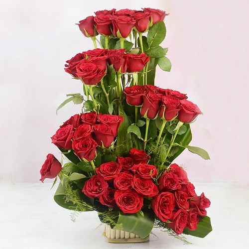 Aromatic Tall Arrangement of Red Roses in Basket	