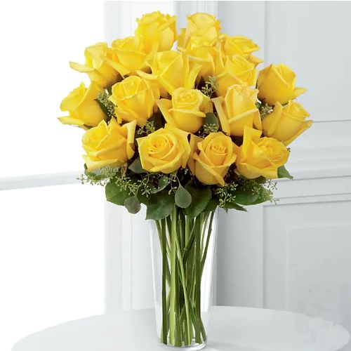 Pretty Long Stem Yellow Roses with Greens in a Vase