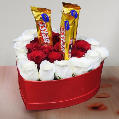 Beautiful Composition of Roses N Chocolates in Heart Box