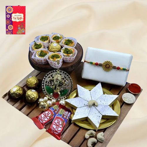 Admirable Gift of Om Rakhi Puja Thali Haldiram Sweets N Chocolates