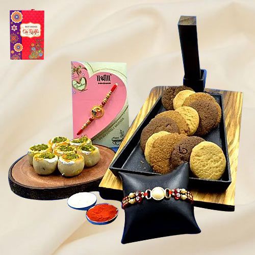 Assorted Cookie Man Cookies n Haldiram Kaju Pista Sweets with 2 Rakhi