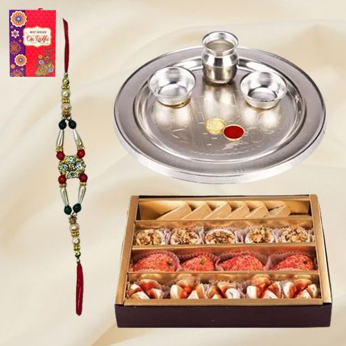 Premium Assorted Sweets from Haldiram and Stylish and Trendy looking Silver Plated Paan Shaped Puja Aarti Thali (weight 52 gms) along Rakhi Roli Tilak and Chawal